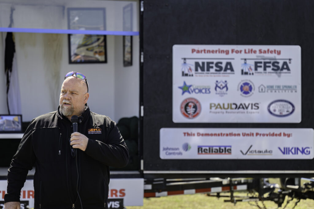 Jeff Hiers Certified Fire and Explosion Investigator with NEFCO addresses Security First Team Members before Burn House Demonstration at the 2026 Storm Response Showcase
